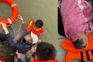 Cảnh sát cứu hộ kịp thời người đàn ông rơi từ cầu Vĩnh Tuy xuống sông Hồng trong thời tiết giá lạnh