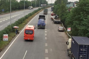 Báo động tình trạng đỗ xe trái quy định trên Quốc lộ 18