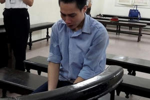 Tử hình kẻ mang xăng đốt nhà, giết Công an viên