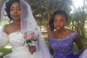 Bị cá sấu cắn cụt tay, cô dâu vẫn đến lễ đường sau tai nạn 5 ngày