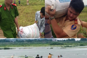 Lực lượng CSGT, công an, quân đội đằm mình "cứu lúa" giúp dân sau trận mưa lớn