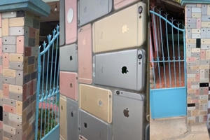 Căn nhà ở Việt Nam bỗng chốc nổi tiếng vì ốp tường rào bằng... iPhone