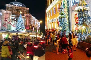 Đêm Noel lạnh ở Hà Nội, ấm áp tại TP HCM