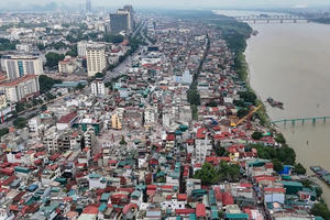 Hà Nội thống nhất di dời và tái thiết toàn bộ khu dân cư ngoài đê sông Hồng