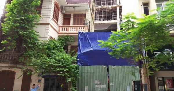 Người dân hoảng loạn phát hiện thêm một nhà 3 tầng nghiêng, lún trên phố Thái Hà Người dân hoảng loạn phát hiện thêm một nhà 3 tầng nghiêng, lún trên phố Thái Hà