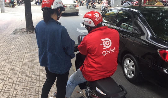 Gặp đối thủ mạnh, Grab bắt đầu xuống nước
