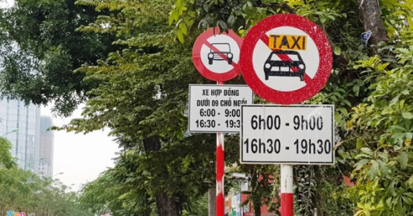 Tài xế Uber, Grab Hà Nội: 'Muốn về nhà chắc phải xé logo'