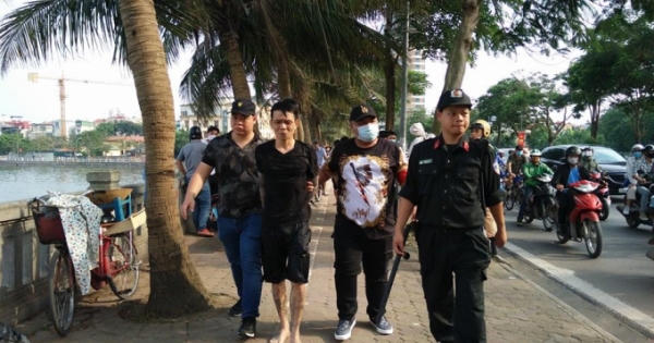 Thấy 141, nam thanh niên bỏ xe tay ga nhảy xuống Hồ Tây chạy thoát thân Thấy 141, nam thanh niên bỏ xe tay ga nhảy xuống Hồ Tây chạy thoát thân