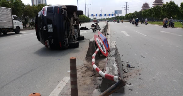 TP HCM: Bị xe buýt lấn làn, Mazda CX9 tông dải phân cách lật nhào giữa đường TP HCM: Bị xe buýt lấn làn, Mazda CX9 tông dải phân cách lật nhào giữa đường