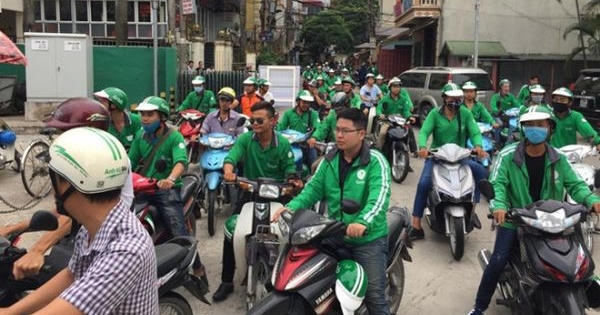 Cần giải quyết dứt điểm “cuộc chiến” giữa Grab và taxi truyền thống Cần giải quyết dứt điểm “cuộc chiến” giữa Grab và taxi truyền thống