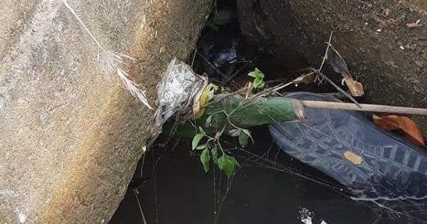 Danh tính thi thể kẹt chặt trong cống nước chỉ lộ phần chân ra ngoài