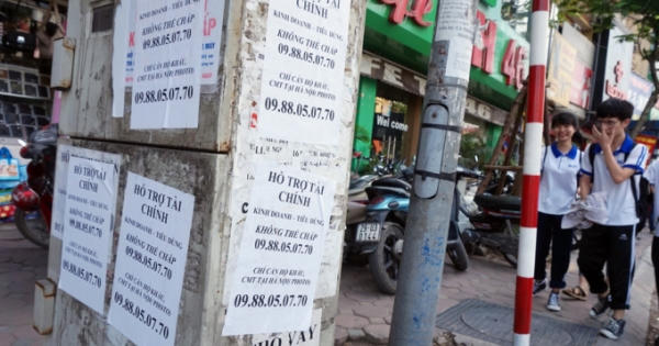 Phạt 10 triệu dán quảng cáo bừa: Có khả thi?
