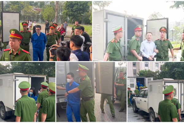 Hình ảnh Phó Đức Nam (tức Mr Pips) và Nguyễn Hòa Bình (tức Shark Bình) được dẫn giải đến tòa