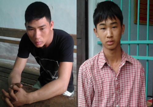 Nguyễn Tất Long  và Đinh Văn Quang tại cơ quan công an