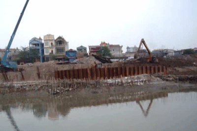 Giao nhầm” đất làm dự án đè lên 16.484,1 m2 hành lang đê sông Ngũ Huyện Khê của xã Phù Khê và phường Đồng Kỵ.