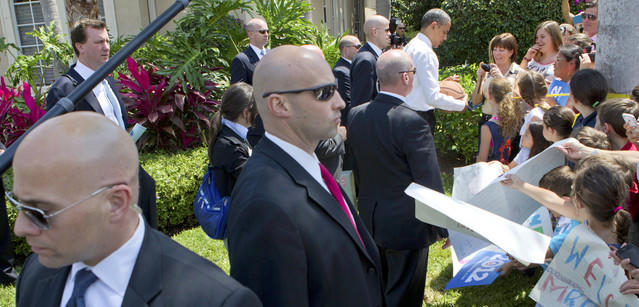 Nhân viên SS  tác nghiệp bảo vệ tổng thống Obama.