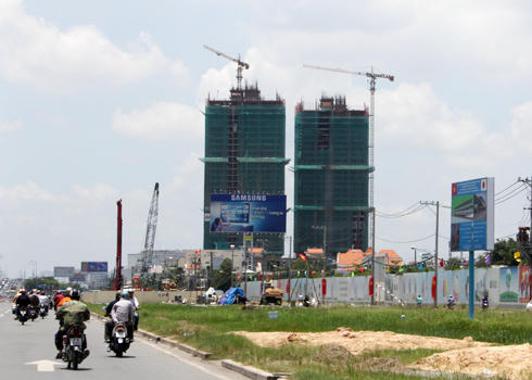 Các doanh nghiệp địa ốc tỏ ra thận trọng và dè dặt khi đánh giá thời điểm bất động sản tăng trường trở lại. Ảnh: Vũ Lê 