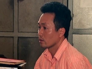 Nguyễn Quang Hiệp tại cơ quan điều tra. 