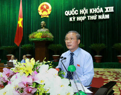 Chủ nhiệm Ủy ban Quốc phòng - An ninh Nguyễn Kim Khoa trình bày báo cáo giải trình trước Quốc hội