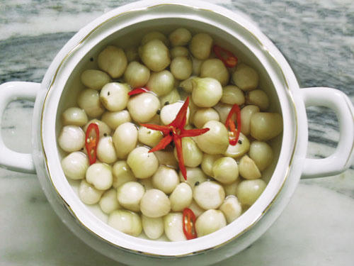 Nguy cơ ung thư dạ dày vì thói quen ăn dưa, cà muối sai lầm - 1