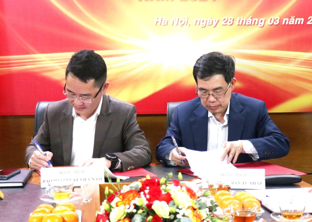 Báo Pháp luật Việt Nam ký kết hợp tác truyền thông với Nhà xuất bản Tư pháp