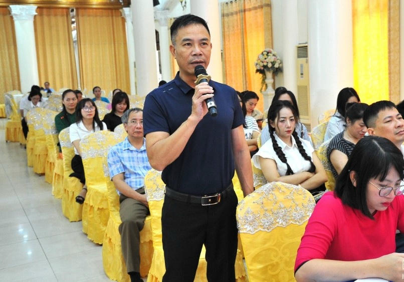 Lãnh đạo một doanh nghiệp nêu ý kiến tại hội nghị.