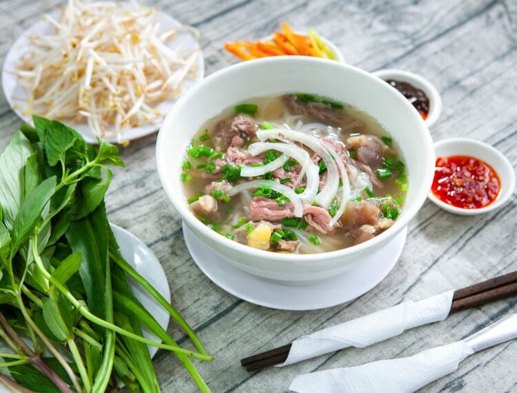 Hương vị phở H&agrave; Nội khiến nhiều người lưu luyến. (ảnh PV)