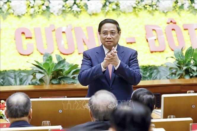 Đồng chí Phạm Minh Chính, Ủy viên Bộ Chính trị, Bí thư Đảng ủy Chính phủ, Thủ tướng Chính phủ dự Đại hội. Ảnh: Doãn Tấn/ TTXVN