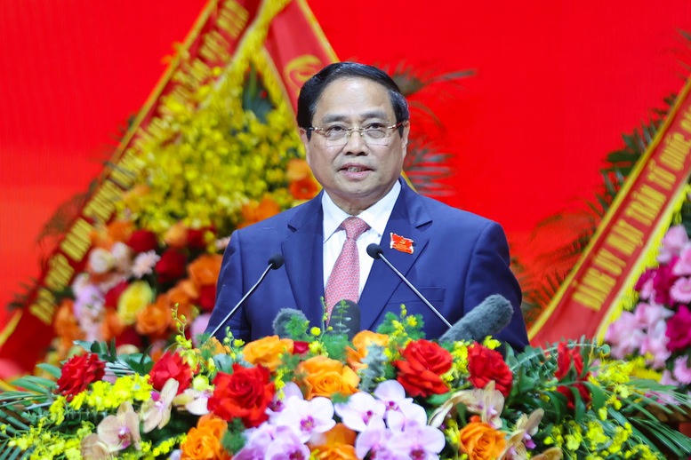 Thủ tướng Phạm Minh Chính nhiệt liệt chào mừng và gửi đến các đồng chí đại biểu, khách quý lời chào trân trọng, những tình cảm nồng ấm và lời chúc mừng tốt đẹp nhất - Ảnh: VGP/Nhật Bắc