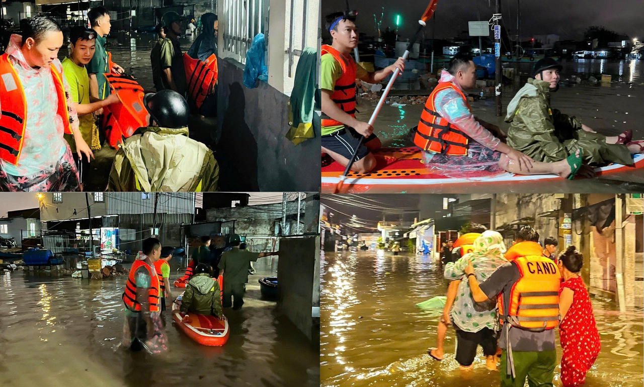 Nhiều người dân tại phường Phan Thiết được lực lượng Công an hỗ trợ di rời.