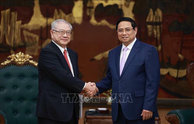 Thủ tướng Phạm Minh Chính tiếp ông Nishimura Teiichi, Chủ tịch Hội hữu nghị Nhật Bản - Việt Nam khu vực Kansai (Nhật Bản). Ảnh: Dương Giang/TTXVN