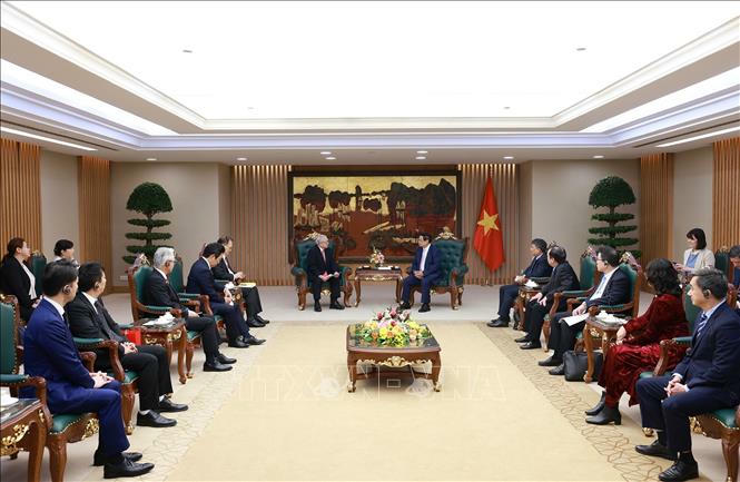 Thủ tướng Phạm Minh Chính tiếp ông Nishimura Teiichi, Chủ tịch Hội hữu nghị Nhật Bản - Việt Nam khu vực Kansai (Nhật Bản). Ảnh: Dương Giang/TTXVN