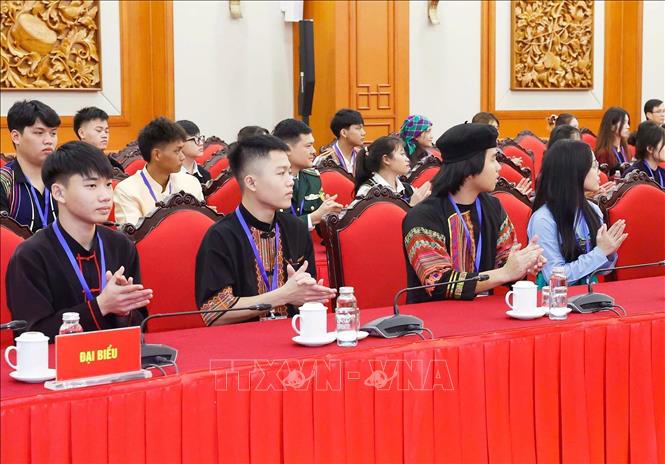 Học sinh, sinh viên, thanh niên dân tộc thiểu số xuất sắc, tiêu biểu tại buổi gặp mặt. Ảnh: Thống Nhất/TTXVN