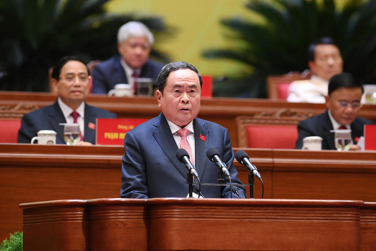 Đồng chí Trần Thanh Mẫn thay mặt Đoàn Chủ tịch báo cáo kết quả bầu Bộ Chính trị, Tổng Bí thư, Ban Bí thư, Ủy ban Kiểm tra Trung ương, Chủ nhiệm Ủy ban Kiểm tra Trung ương khóa XIV.