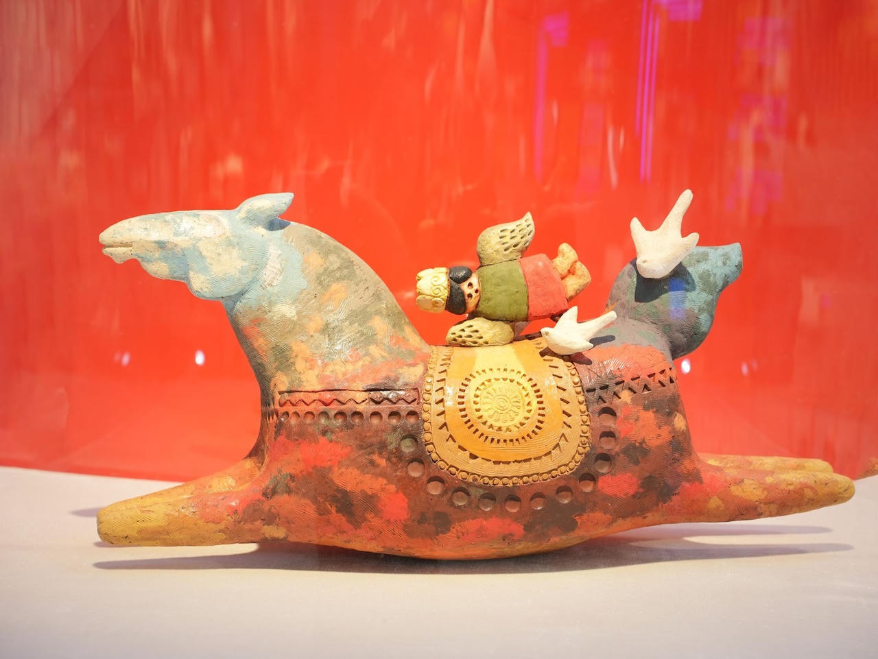 A statue of a horse with a person riding on itAI-generated content may be incorrect.