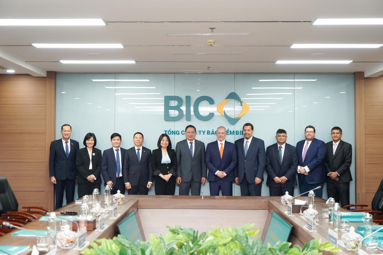 A group of people in suits standing in front of a wall
AI-generated content may be incorrect.