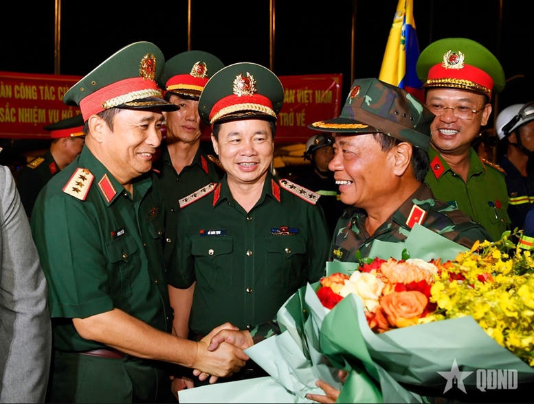 Đoàn cứu hộ, cứu nạn Việt Nam trở về nước, hoàn thành nhiệm vụ tại Venezuela- Ảnh 2.