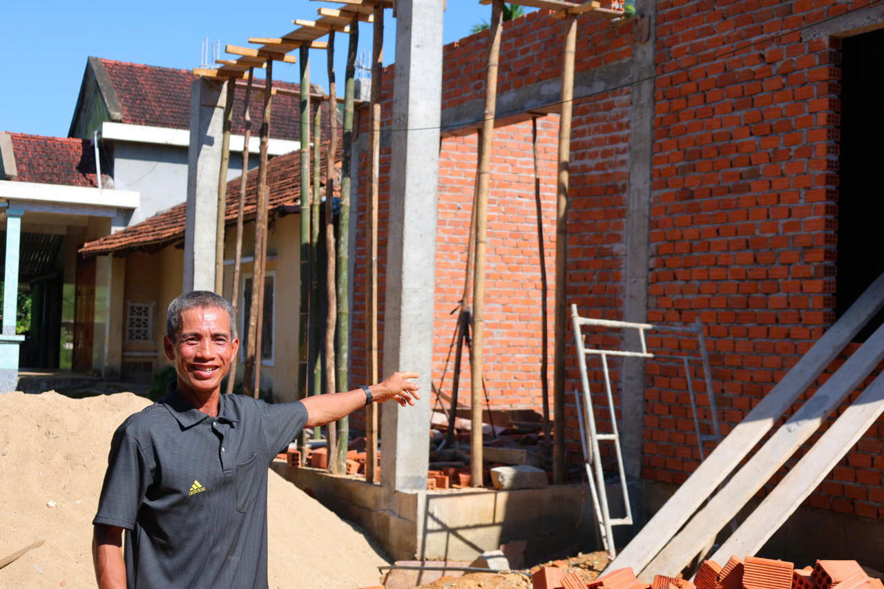 Niềm vui của gia đình ông Ngoạt (ảnh Vân Anh)