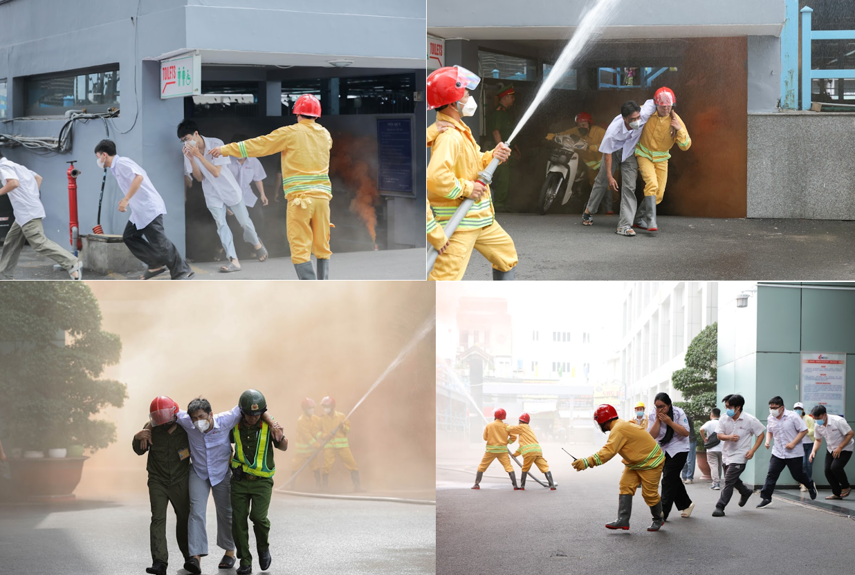 Lực lượng chức năng hướng dẫn người dân thoát nạn và tổ chức sơ cứu các nạn nhân ra khỏi khu vực xảy ra cháy (Ảnh: Ban Tổ chức)