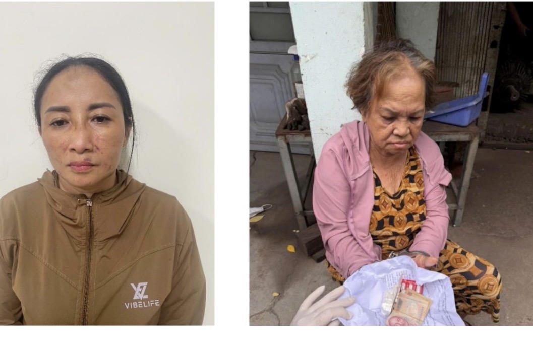 Bắt giữ đối tượng Lê Thị Mai Dung và Nguyễn Thị An (từ trái qua phải) khi đang thực hiện hành vi mua bán trái phép chất ma túy. Ảnh: CAĐN