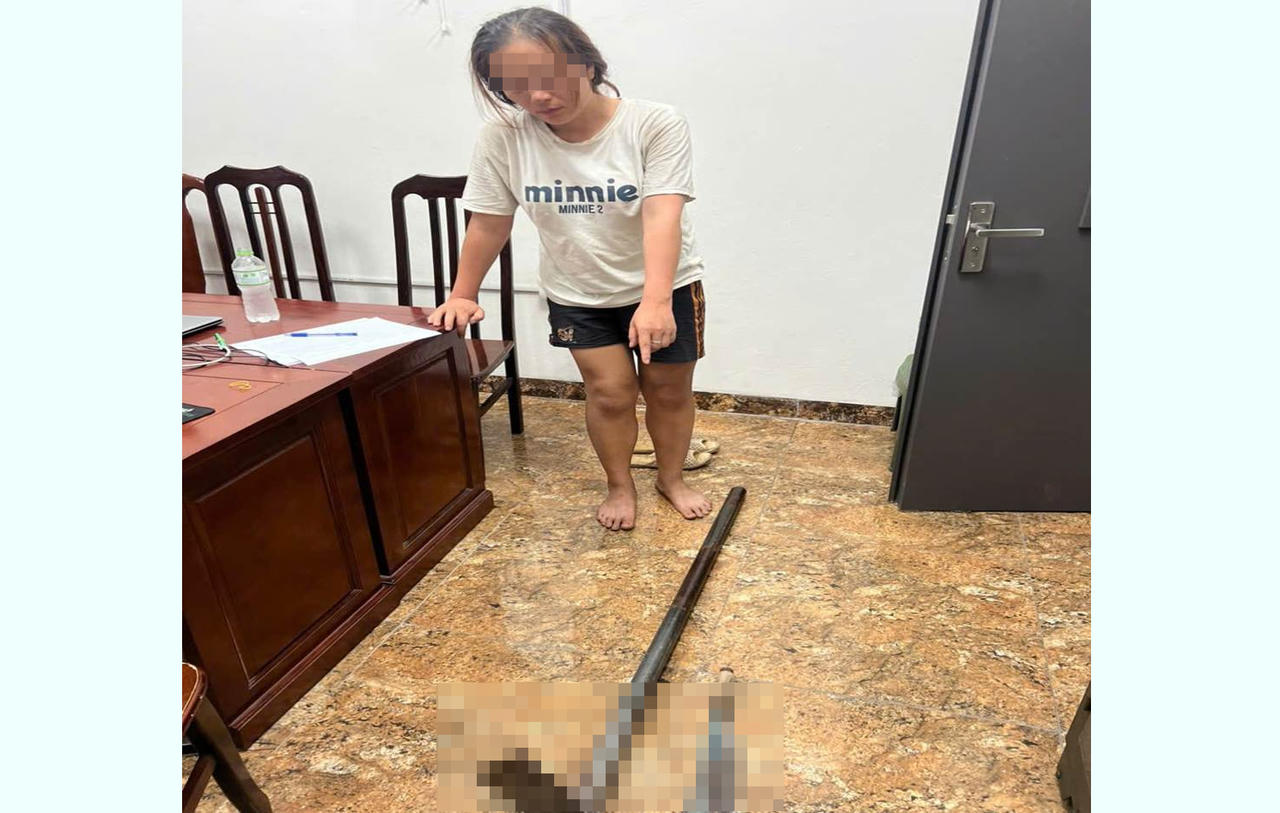 Bắt tạm giam người phụ nữ cầm dao, cuốc đuổi đánh người dân