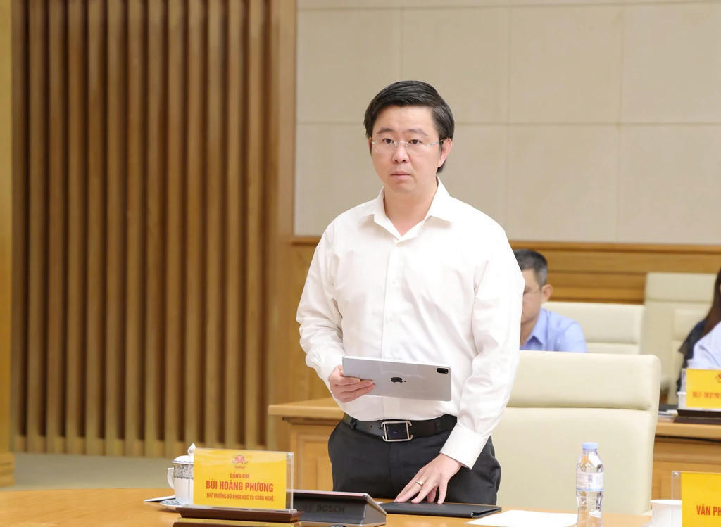Thứ trưởng Bộ Khoa học và Công nghệ Bùi Hoàng Phương báo cáo tại Hội nghị. (Ảnh: MST)