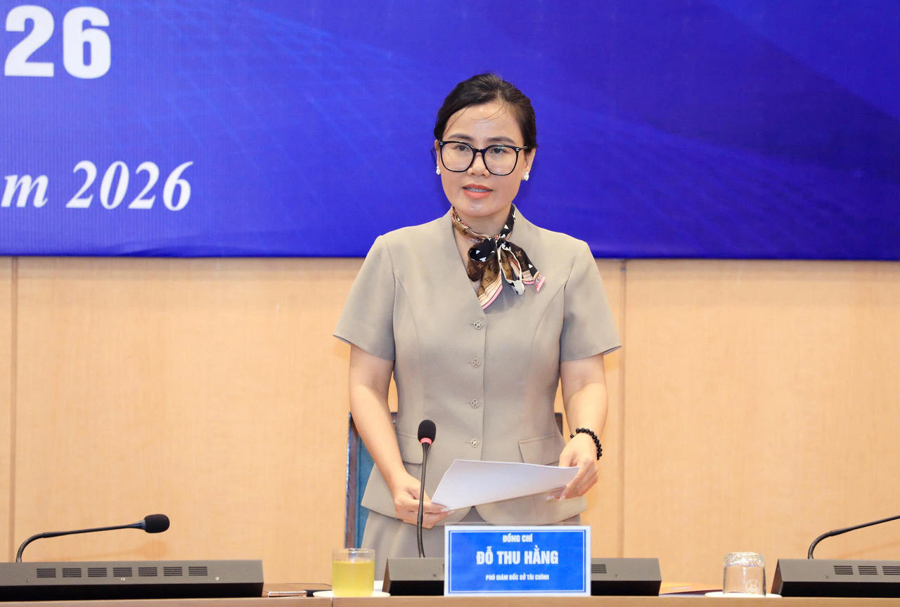 Phó Giám đốc Sở Tài chính Hà Nội Đỗ Thu Hằng thông tin tại họp báo.