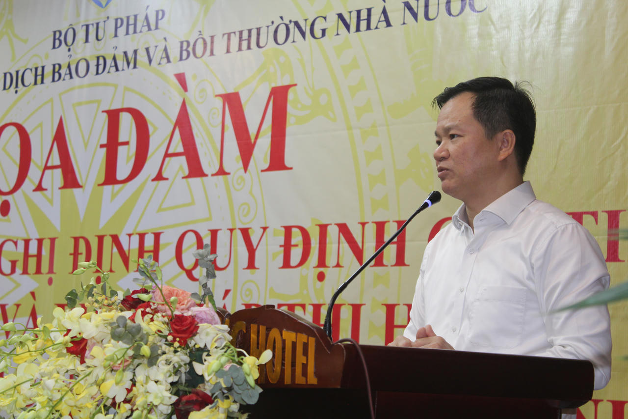Ông Nguyễn Ngọc Vũ - Phó Cục trưởng Cục Đăng ký giao dịch bảo đảm và Bồi thường nhà nước phát biểu tại buổi tọa đàm. (Ảnh Trọng Triển)