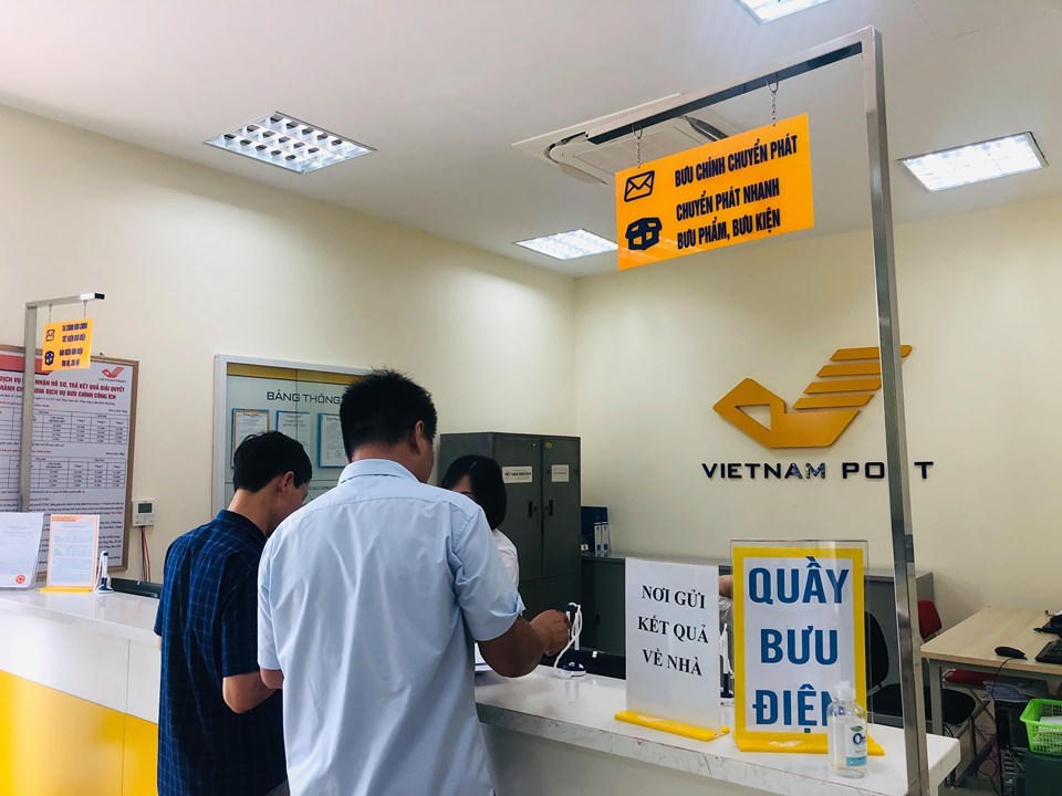 Thí điểm triển khai dịch vụ công qua mạng bưu chính công cộng tại Hà Nội, Huế, Gia Lai