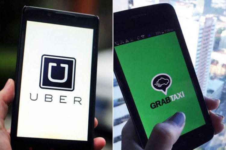 Bộ GTVT đốc thúc hãng xe Uber, Grap dán logo