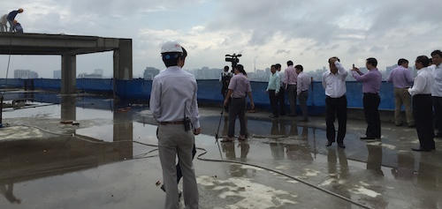 Bắt đầu "cắt ngọn"toà nhà 8B Lê Trực