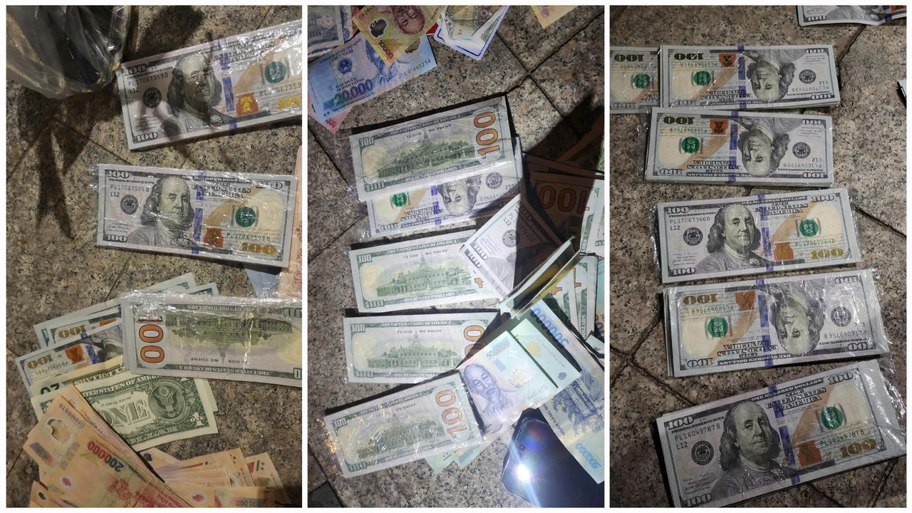 Bắt giữ 3 người nước ngoài dùng 100 USD giả mua sắm và đổi tiền Việt