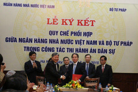 Ngân hàng nhà nước - Bộ Tư pháp: Ký Quy chế phối hợp  trong công tác THADS