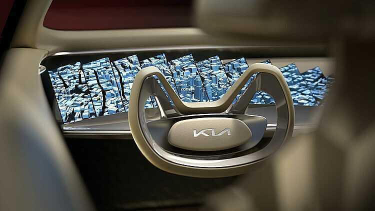 Logo Kia mới trên vô-lăng mẫu concept Imagine. Ảnh: Kia